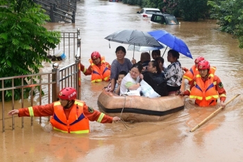 china flood latest news four cities declare top level warnings millions people affected